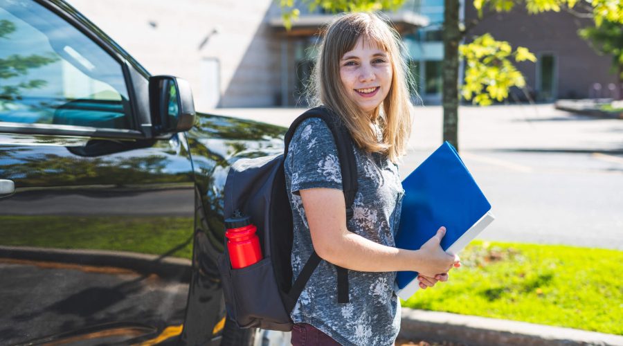 college student in parking lot