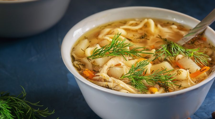 Fresh Cooked Chicken Noodle Soup in Bowl Closeup